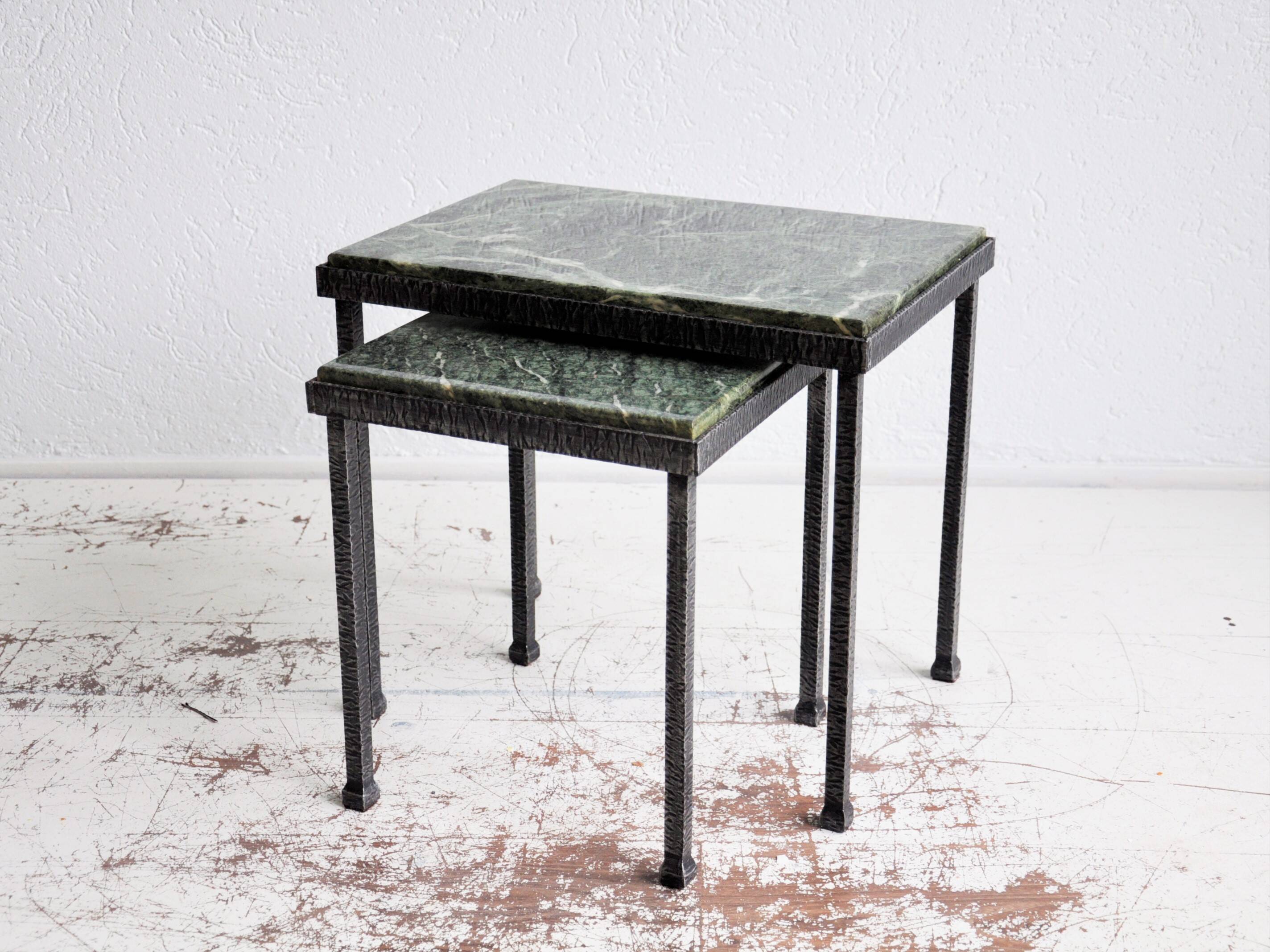 Green nesting coffee table with marble top and iron frame