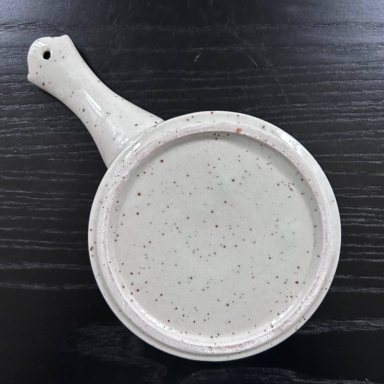 Frying pan with red fruit decoration
