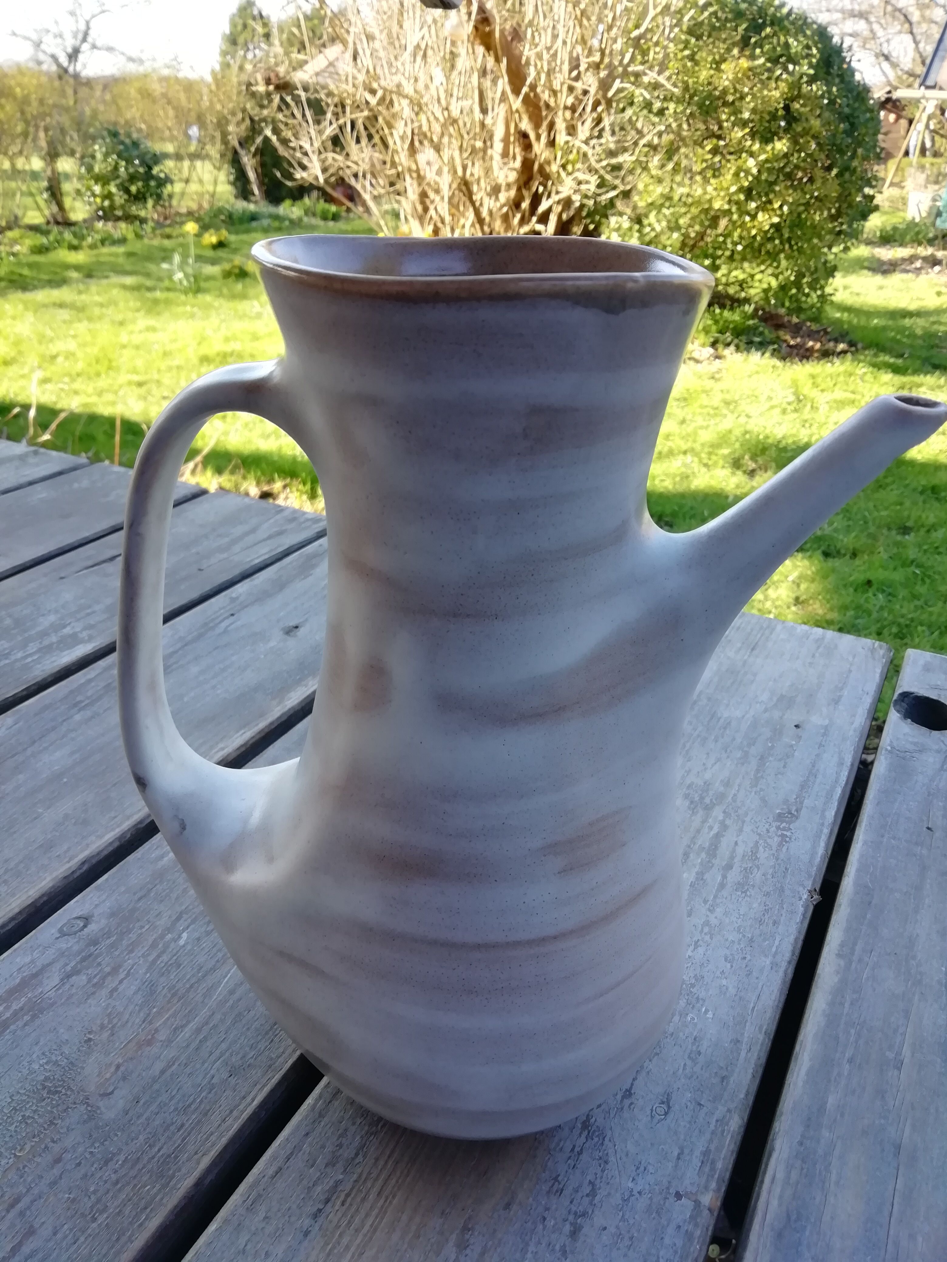 Trio of artisan sandstone teapots
