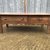 Old coffee table from the Guérandais region in solid oak with 2 front drawers