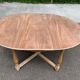 Renovated round extendable farmhouse dining table made of solid wood, 115cm.