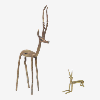 Antelope gazelle and its small brass