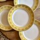 Set of 10 vintage white, yellow and gold dinner plates