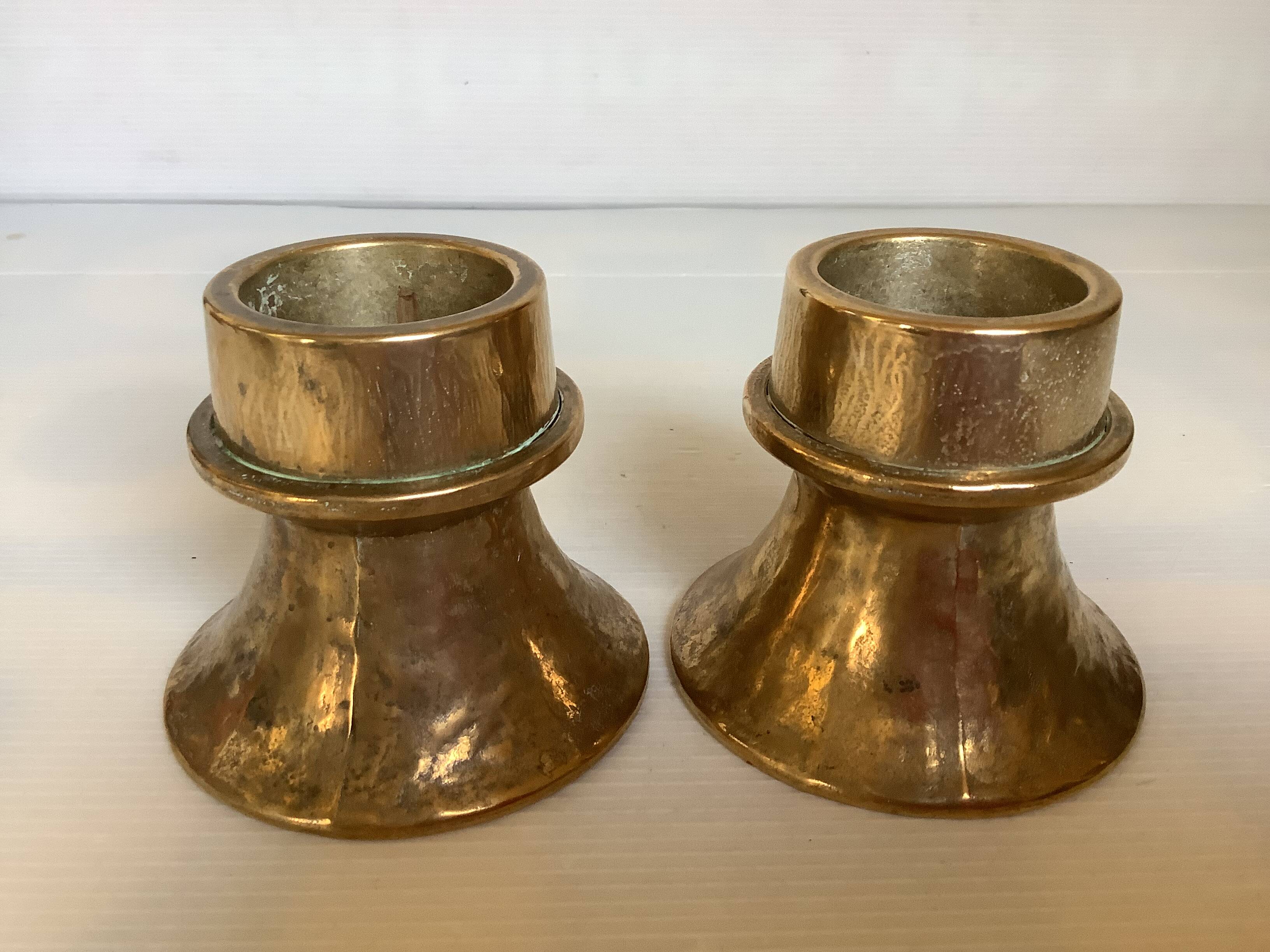 Pair of bronze candlesticks with tulip base