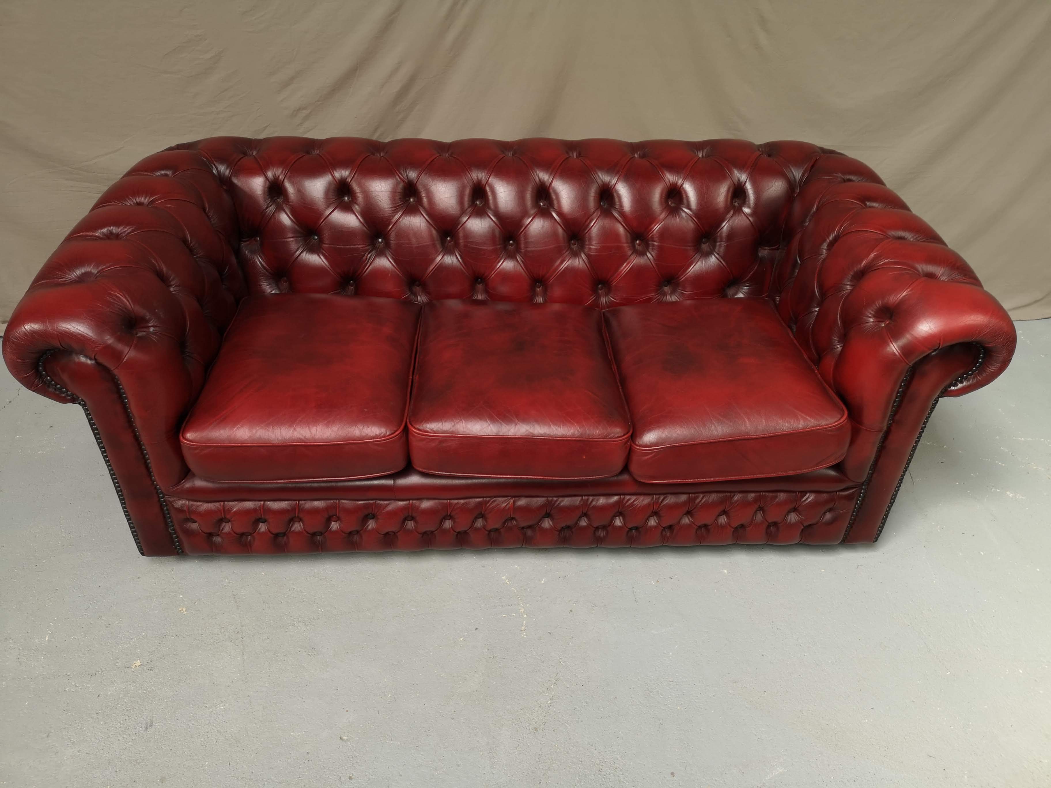 Red leather chesterfield sofa