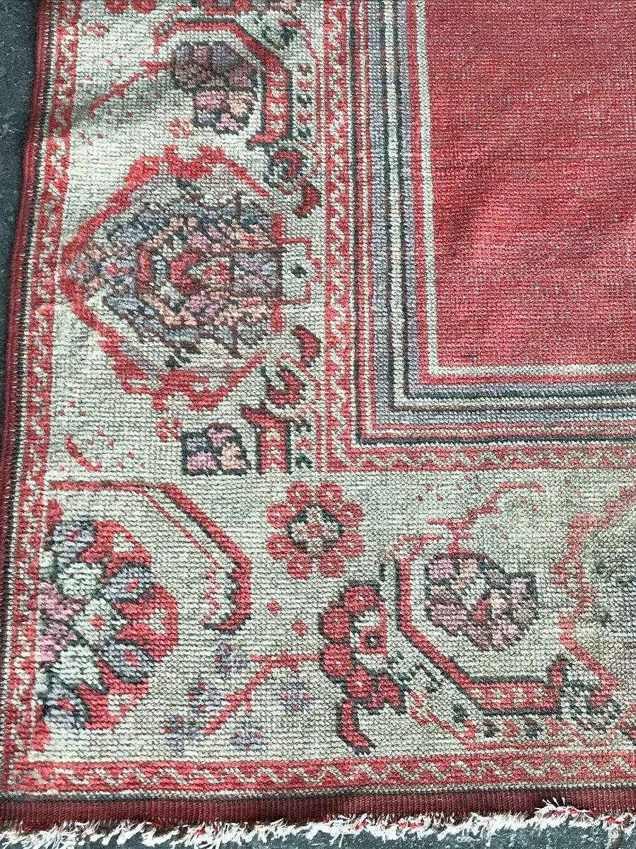Vintage brown Kilim prayer rug in wool, Turkish mihrab pattern from the 1930s.