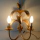 Pair of gold metal palm sconces, 70s