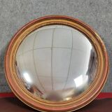 Miroir en bois doré patiné « oeil de sorcière » époque 1900  glace bombée e