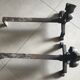 Pair of bronze fireplace firedogs with fleur-de-lys decor, art deco