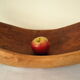 Brutalistic cut in exotic wood boomerang shape