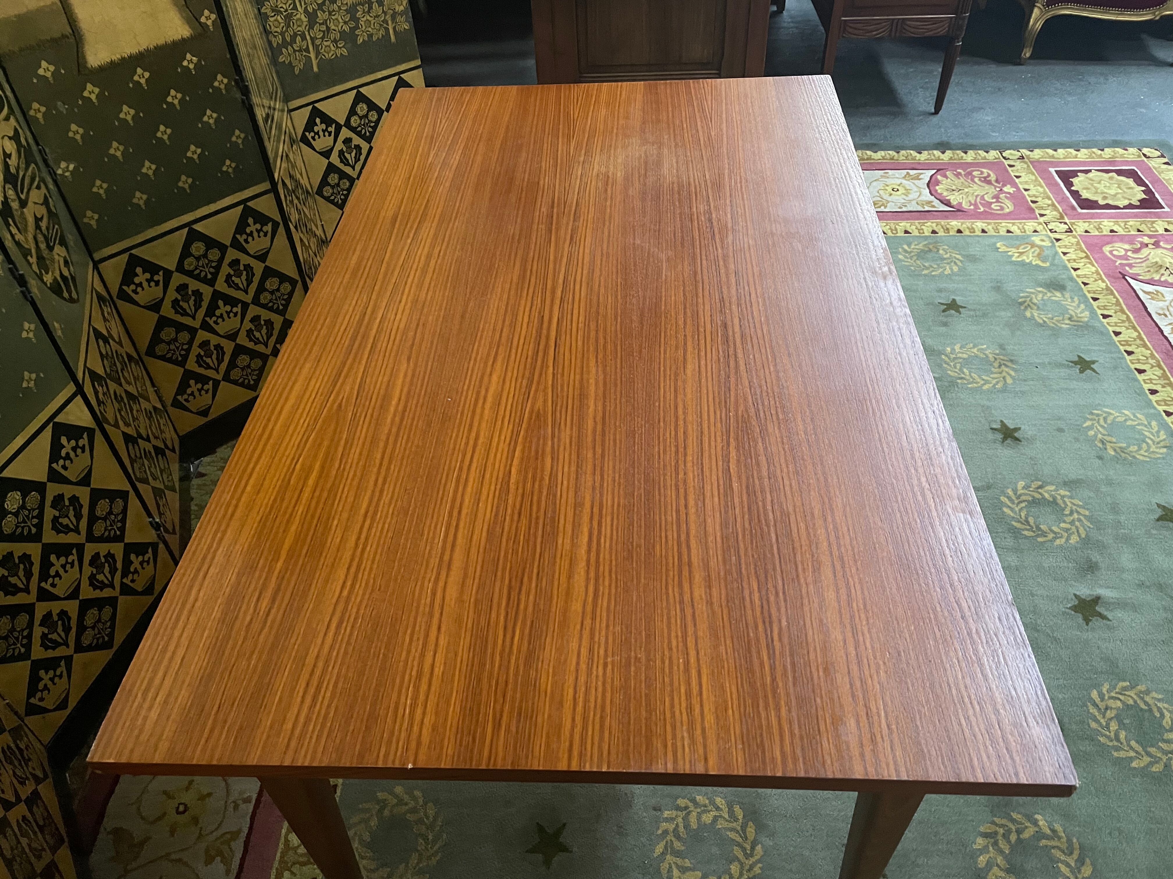 Scandinavian dining table with built-in extensions