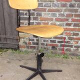 workshop chair adjustable in height, metal footing and seating and wooden back