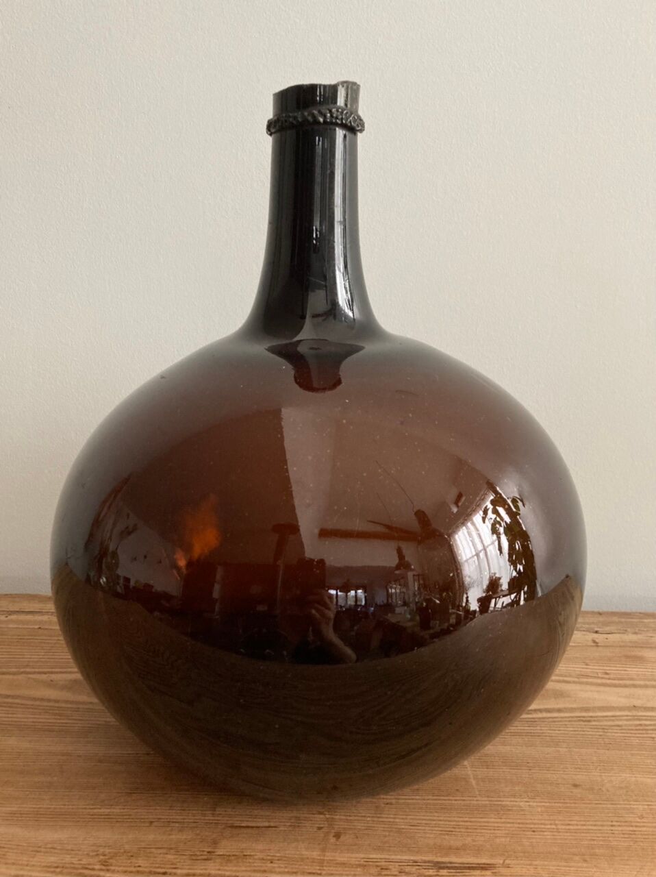 Old amber demijohn