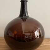 Old amber demijohn