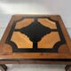Table basse en bois a décor géomètrique XX siècle