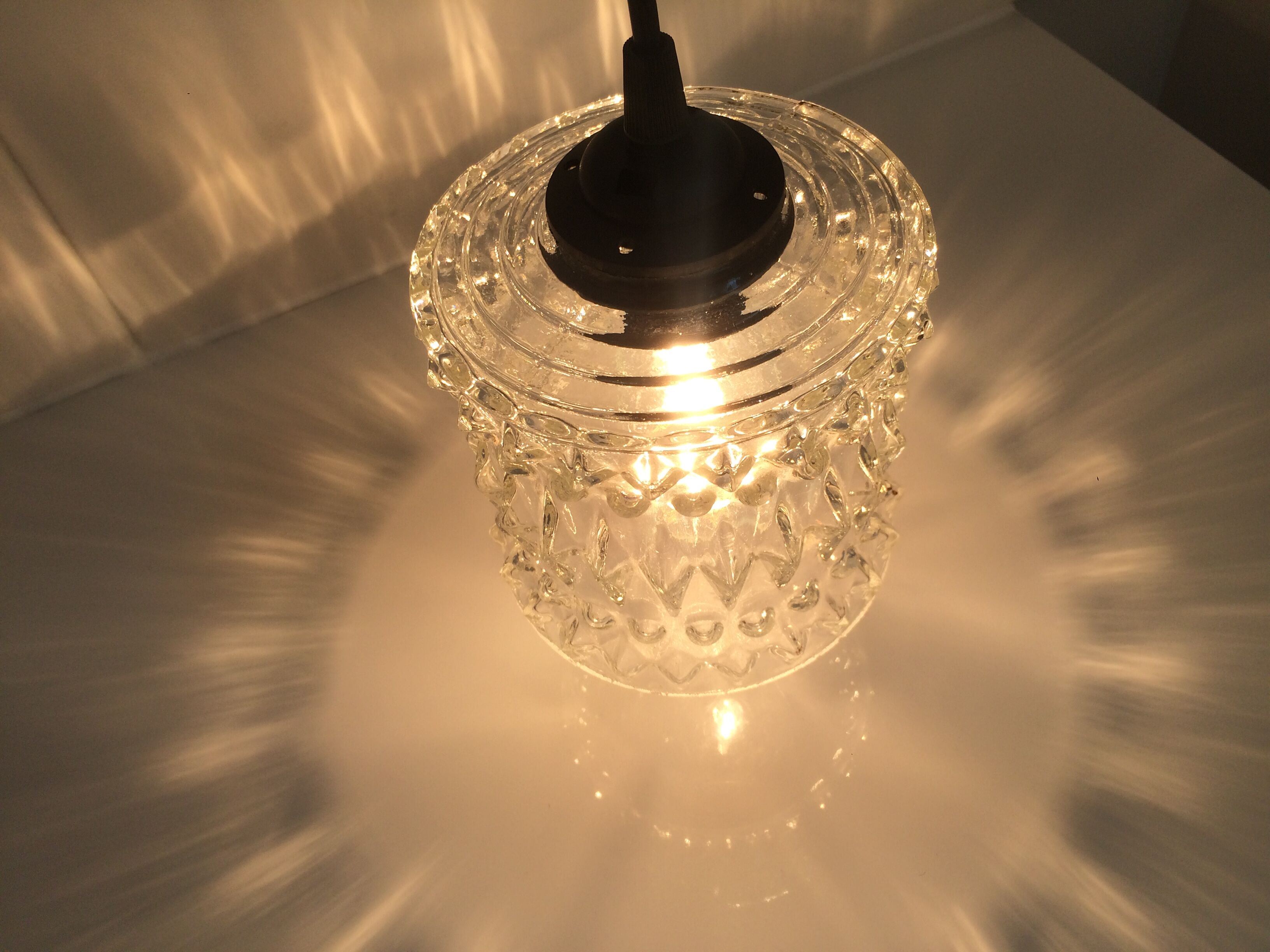 Chiseled glass suspension