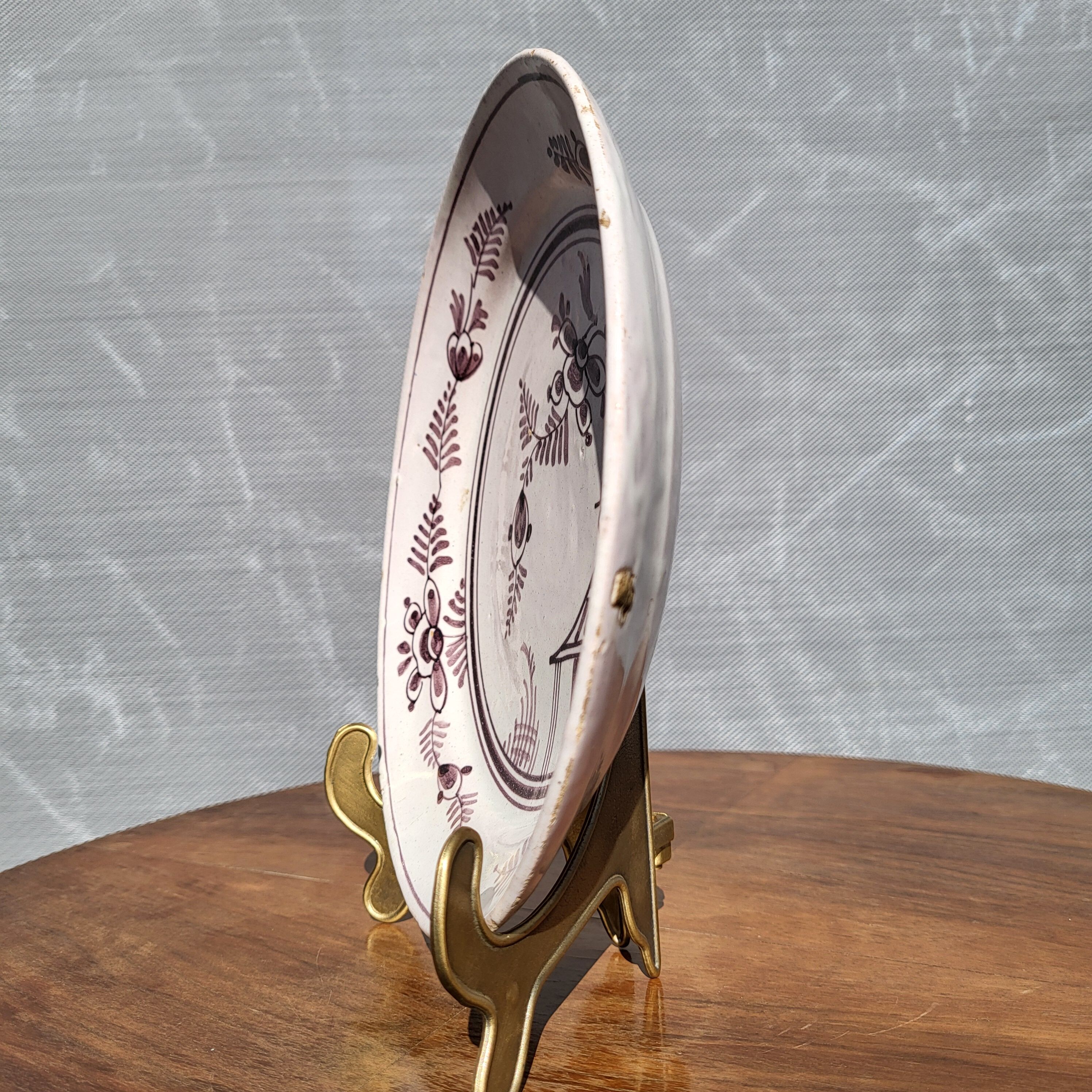 Grand Feu earthenware plate, Manganese decoration - 18th century