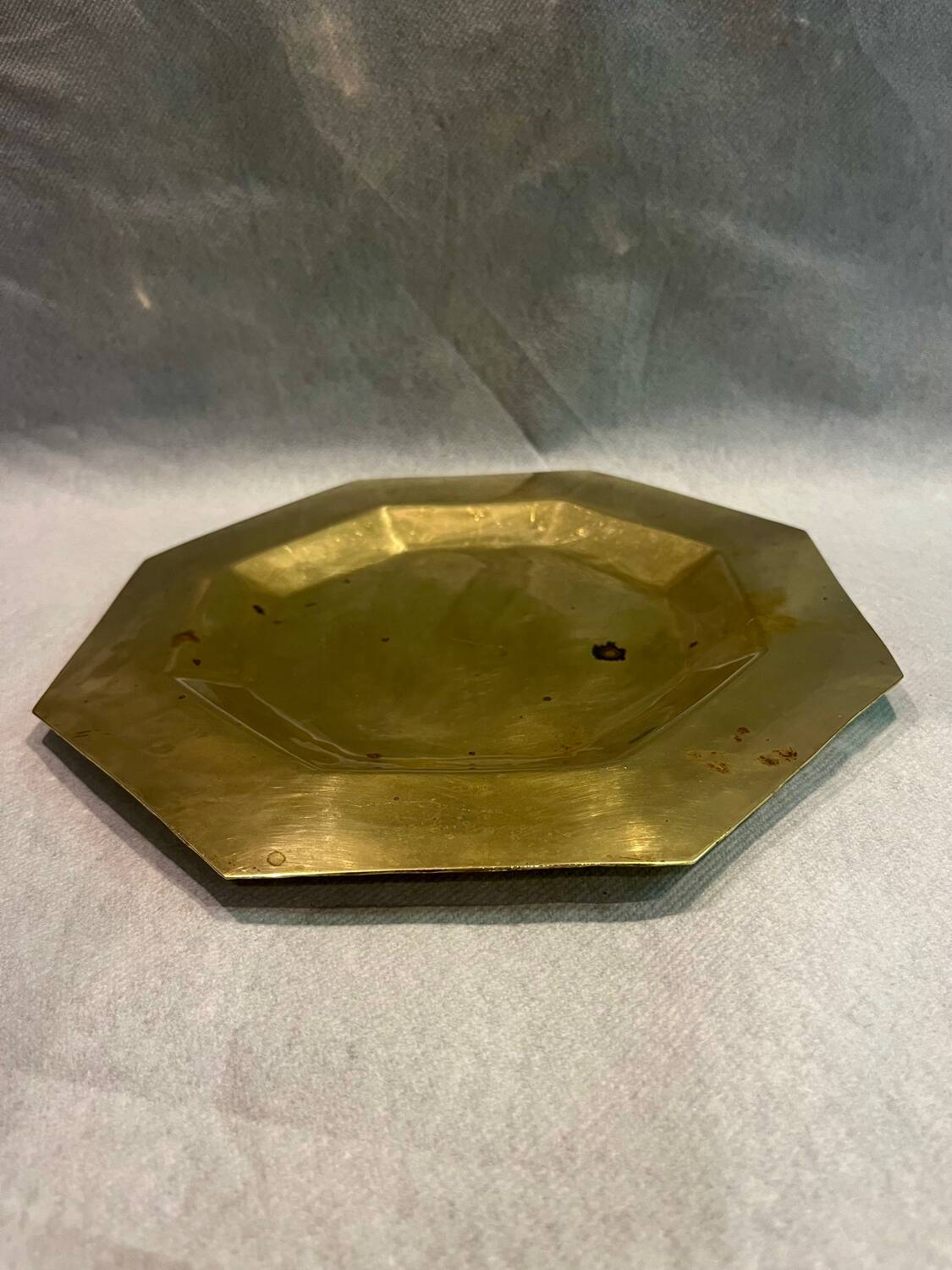 Octagonal brass plate