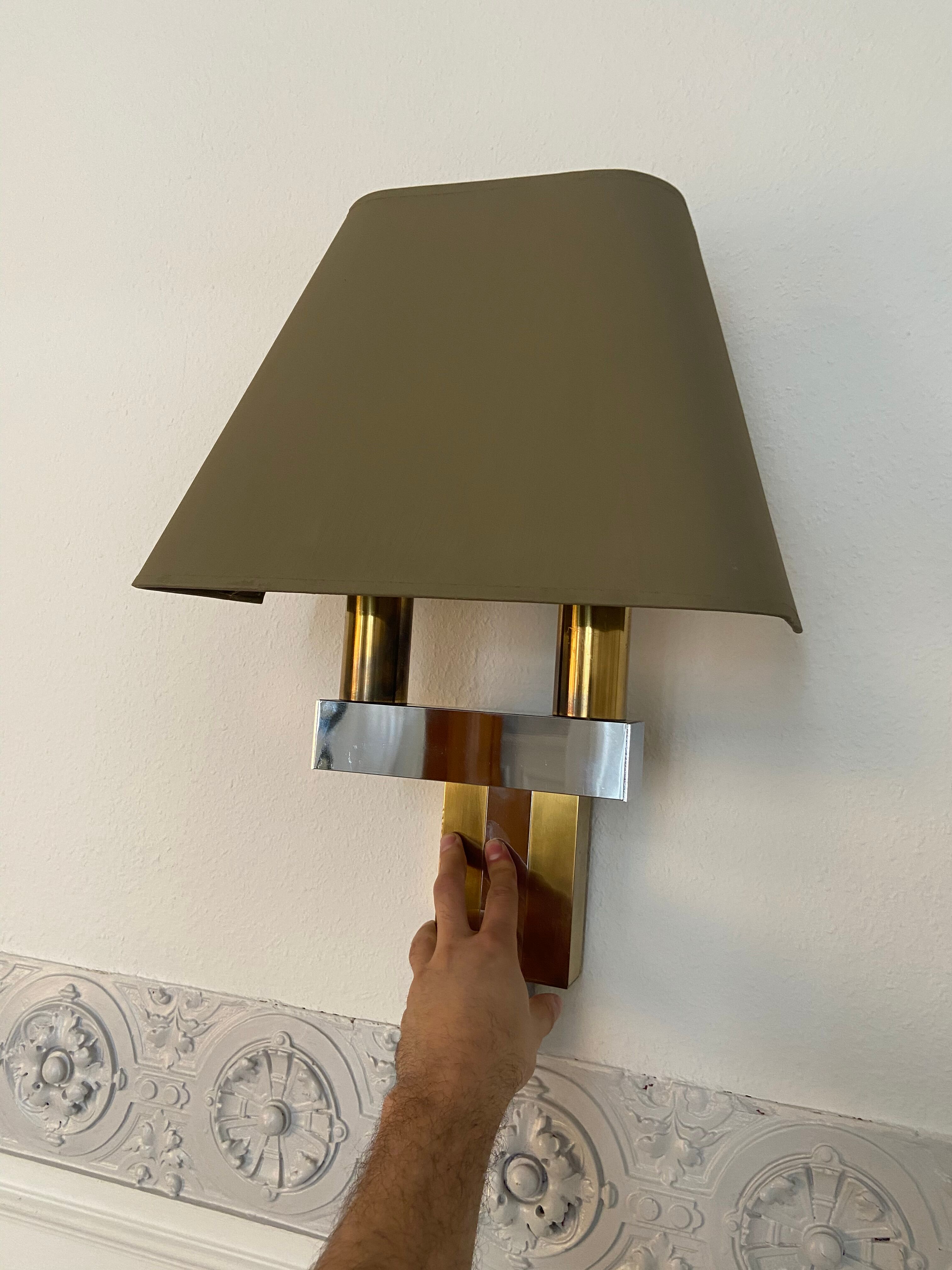 Pair of chrome and brass sconces, Italy, 1970s