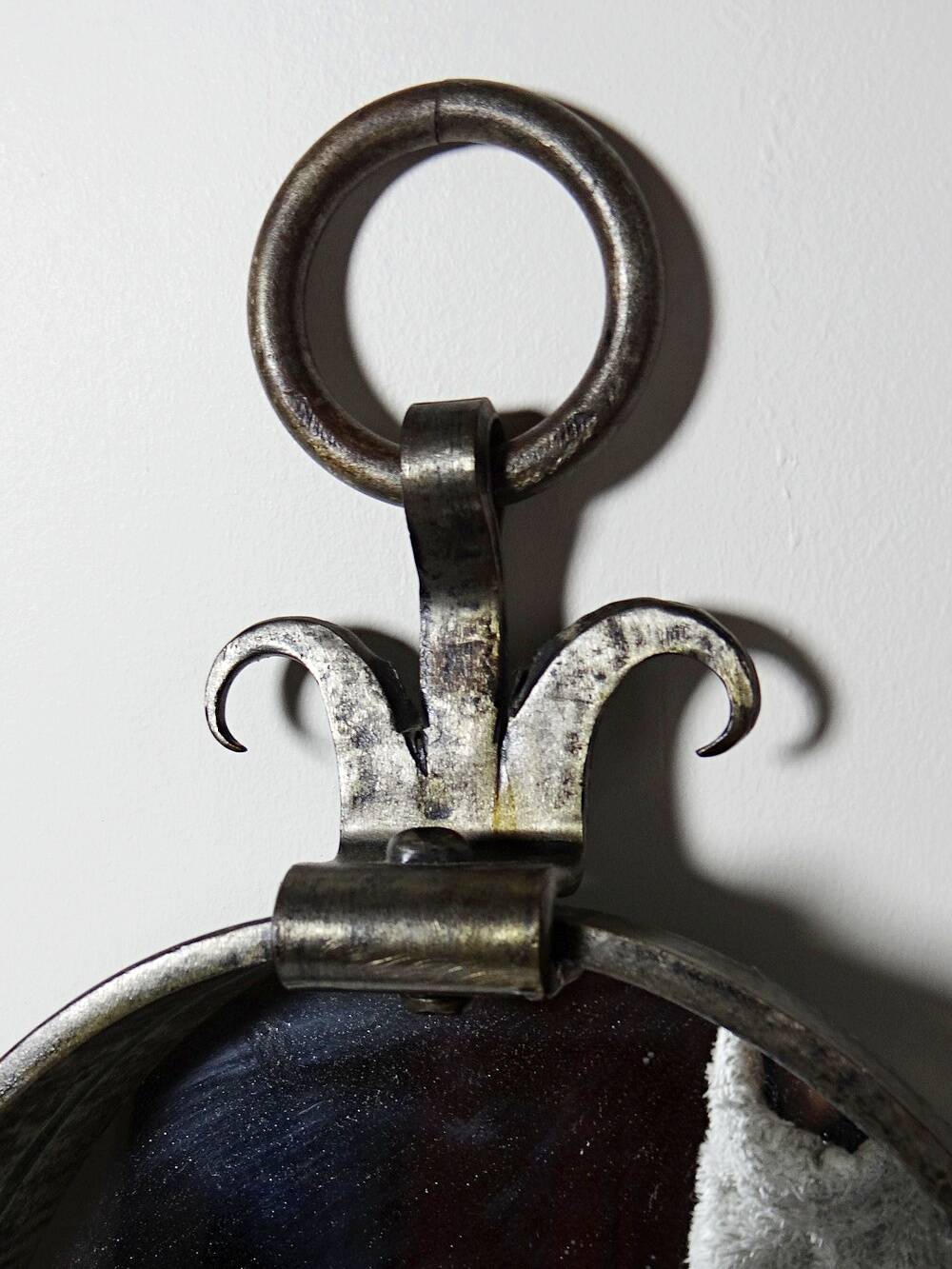 Oval mirror in handcrafted wrought iron, mid-century brutalist vintage from the 50s-70s.