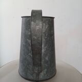Bent zinc garden pitcher