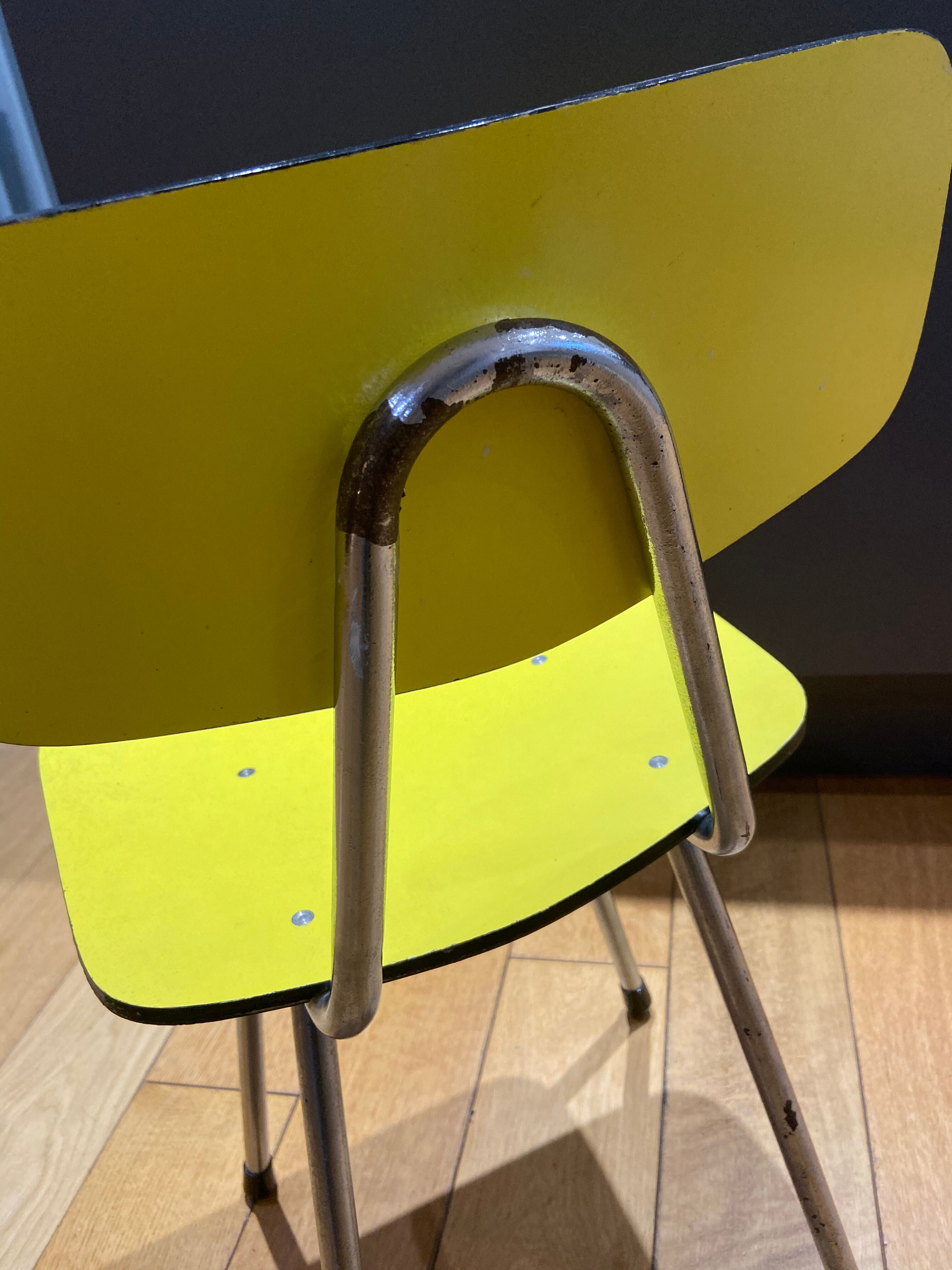 Yellow chair in child formica