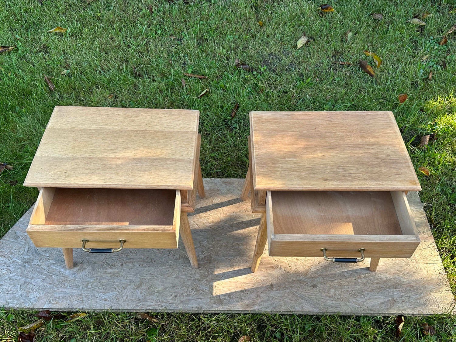 Vintage bedside tables with compass feet