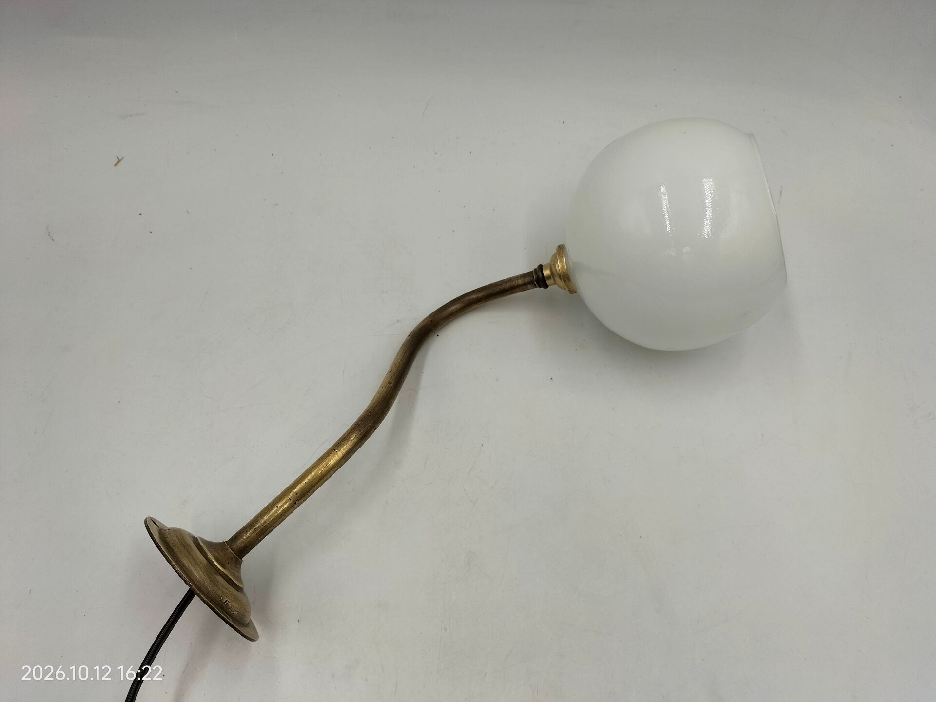 Brass and glass wall light