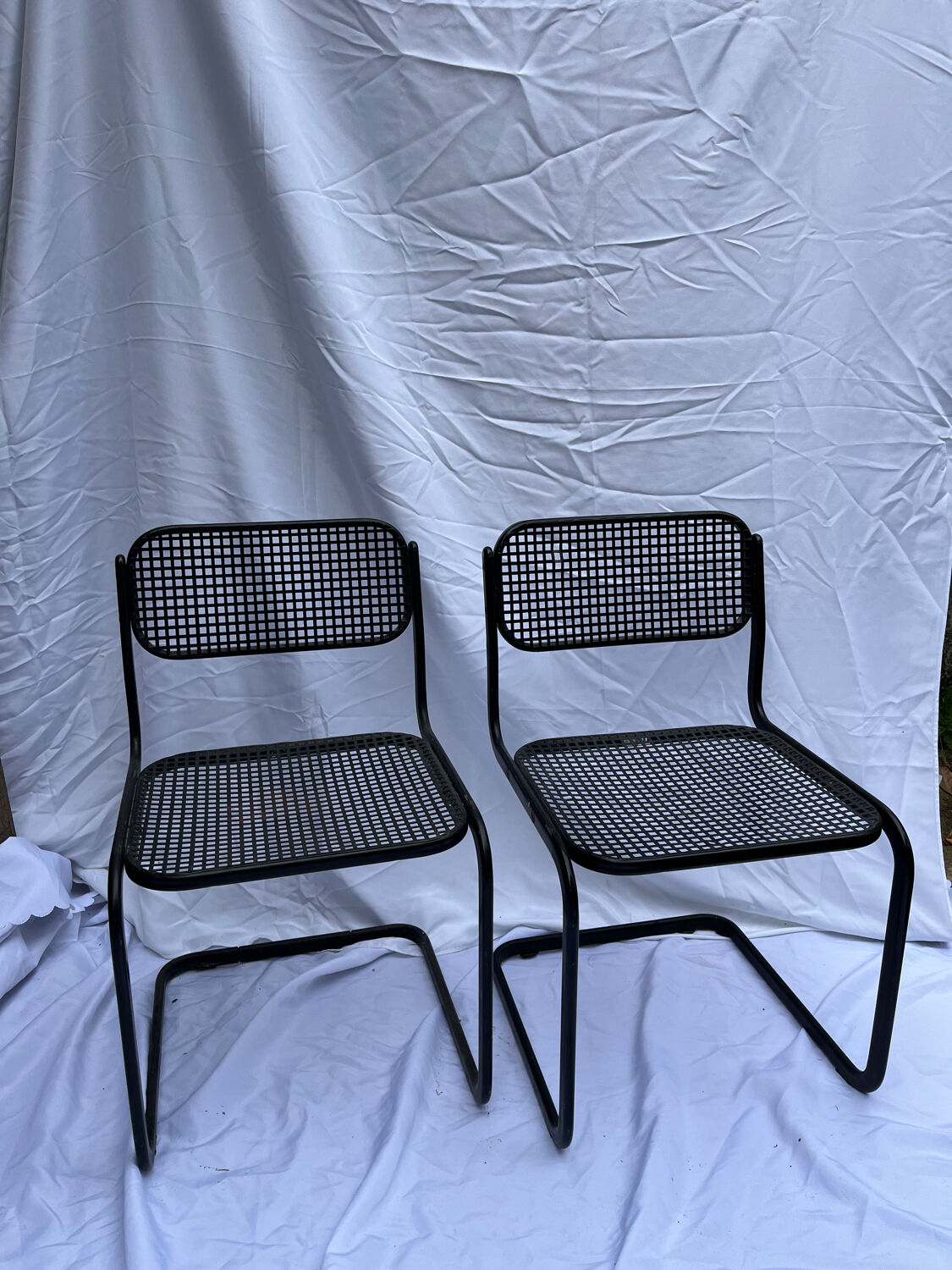 2 metal chairs