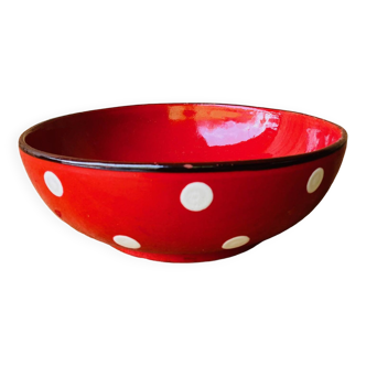 Red ceramic salad bowl with white polka dots