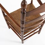 Antique wooden armchair with cane seat, France ca. 1900