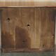 Vintage wooden furniture for 45 wine bottles with a drawer.
