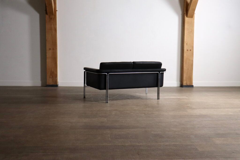 Horst Brüning Model 6912 two seater sofa in black leather for Kill International, Germany 1967