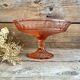 Pink glass cup, fruit bowl