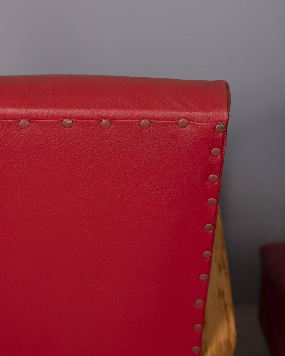 Pair of vintage 1950's armchairs in red leather, italian design
