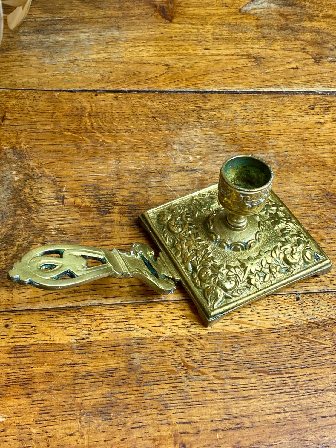 Bronze hand candlestick