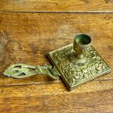 Bronze hand candlestick