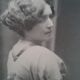 Elegant woman portrait black and bench art deco