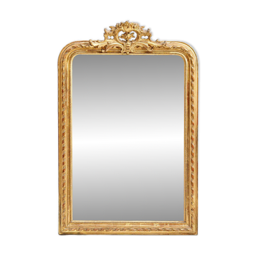 Louis-Philippe mirror from the 19th century with a ribbon trompe-l'œil frame.