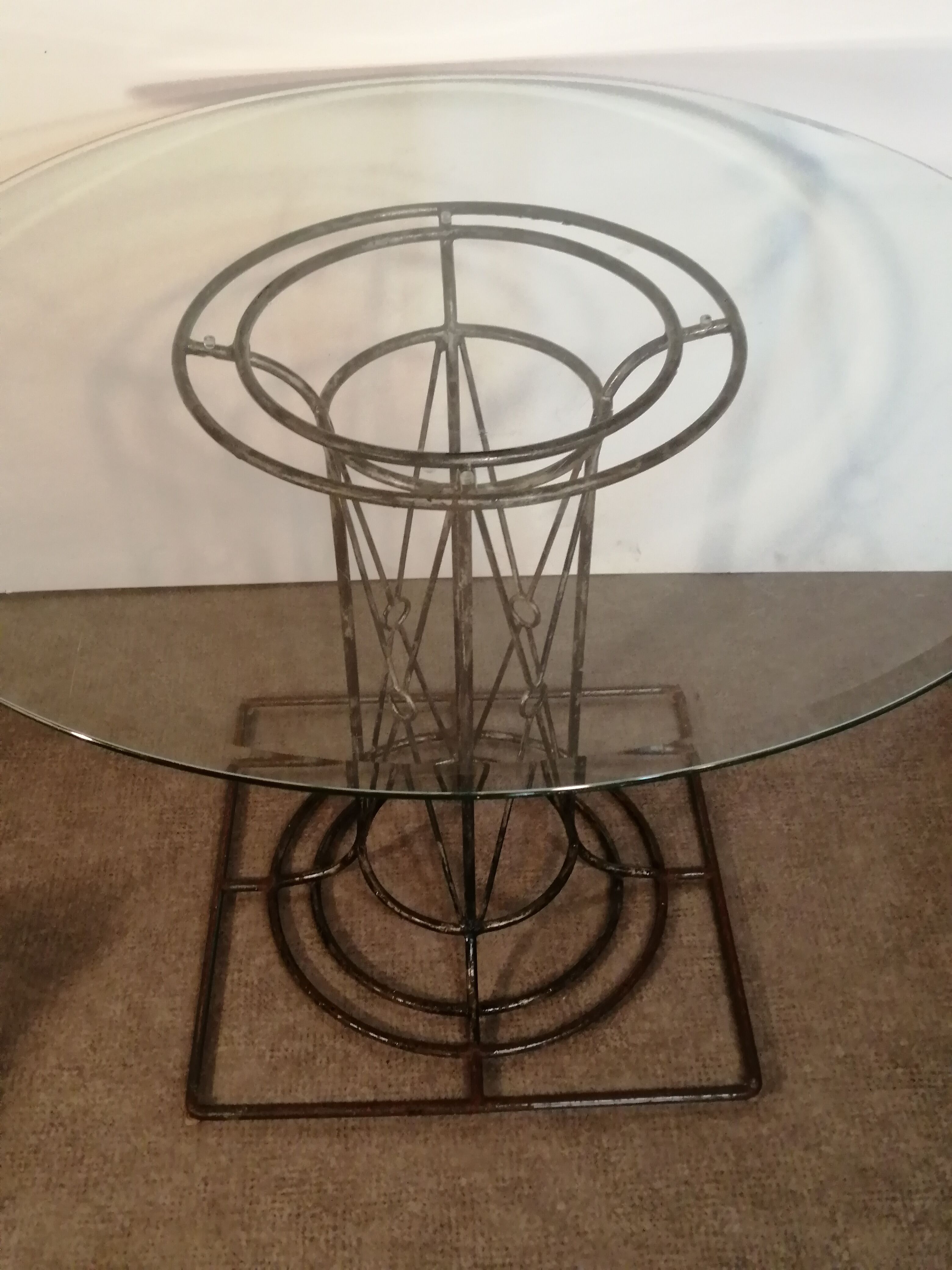 Wrought iron dining table with beveled round glass top, vintage 1980