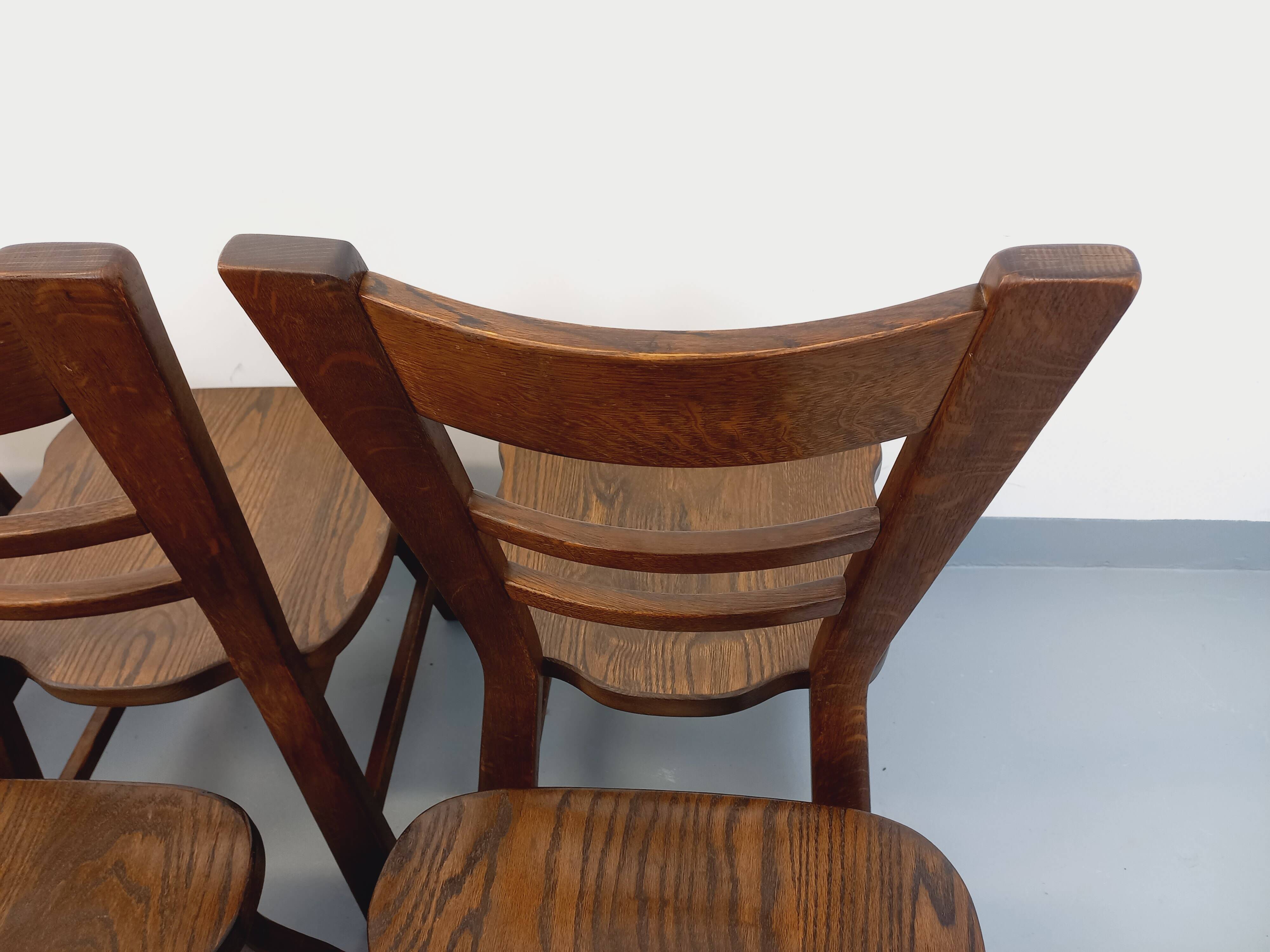Set of 6 vintage brutalist oak chairs from the 1950s.