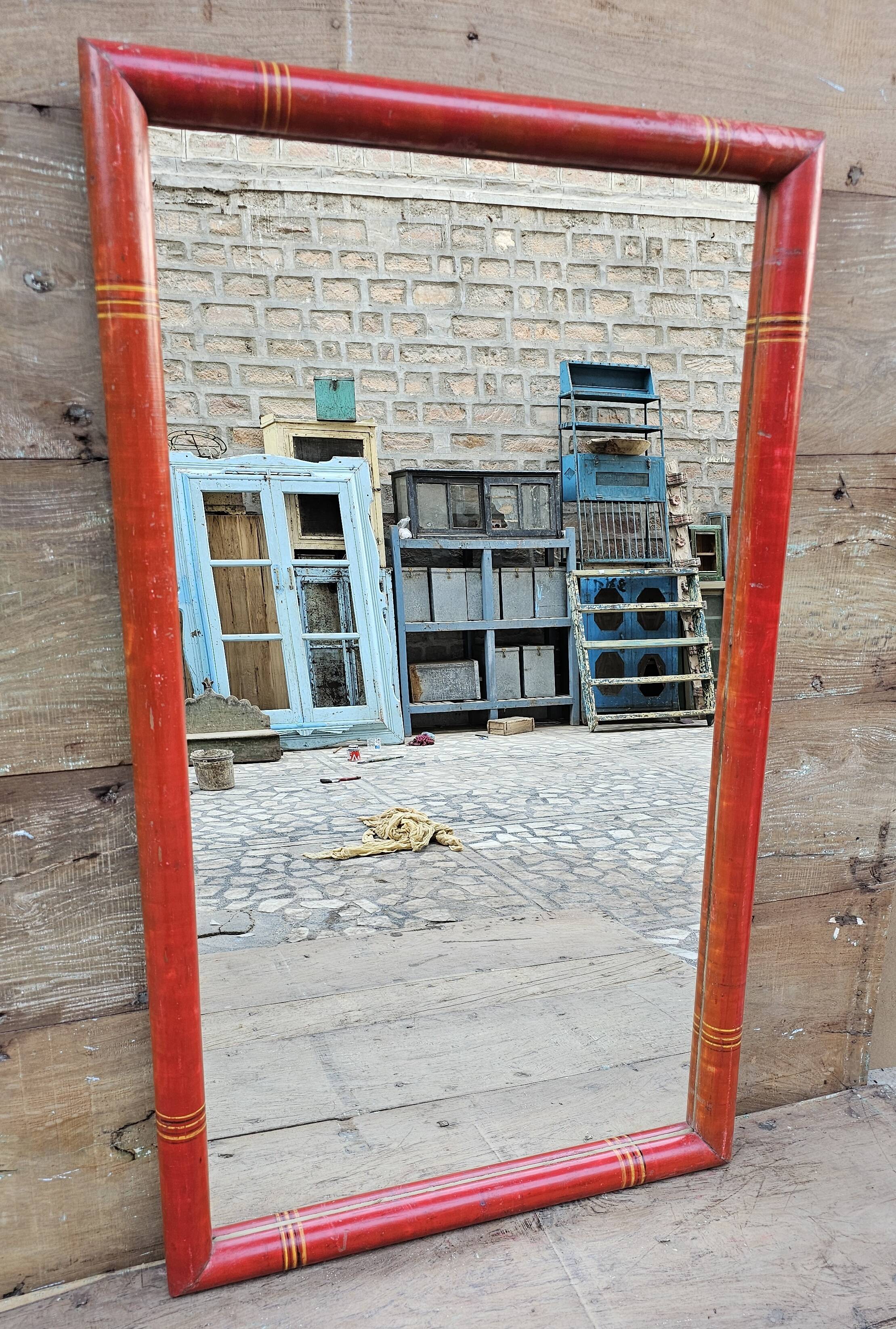 Antique mirror in Burmese teak.
