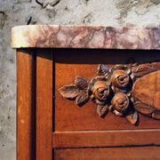 French antique bedside table in walnut with a marble top and porcelain interior, early 20th century.