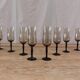 8 vintage smoked champagne flutes with black feet Arcoroc