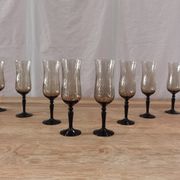 8 vintage smoked champagne flutes with black feet Arcoroc