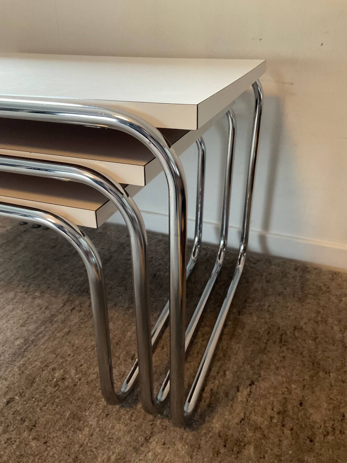 Trio of vintage nesting tables in Formica and chrome metal