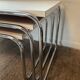 Trio of vintage nesting tables in Formica and chrome metal