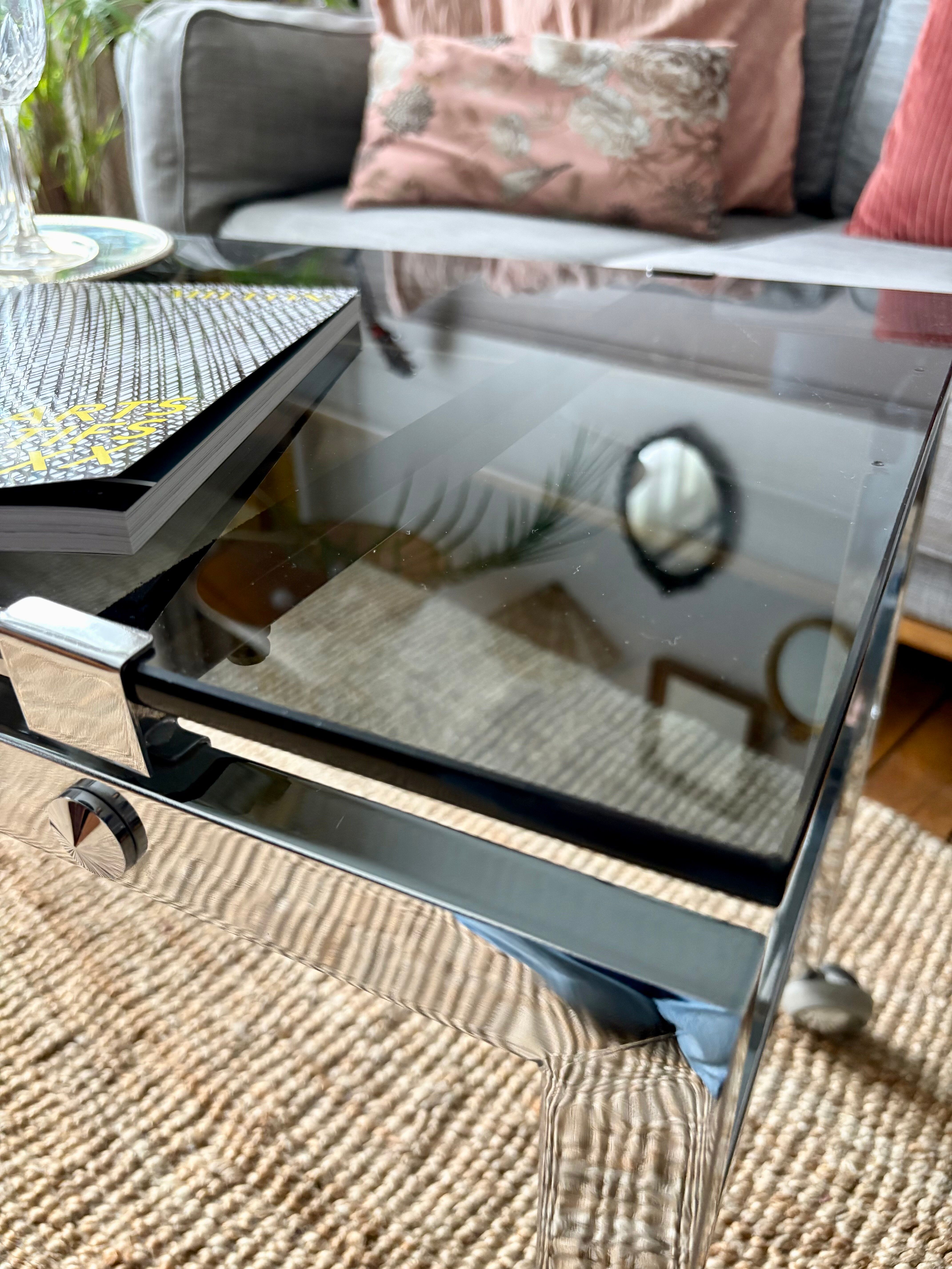 Chrome and smoked glass coffee table on wheels 1970
