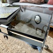 Chrome and smoked glass coffee table on wheels 1970