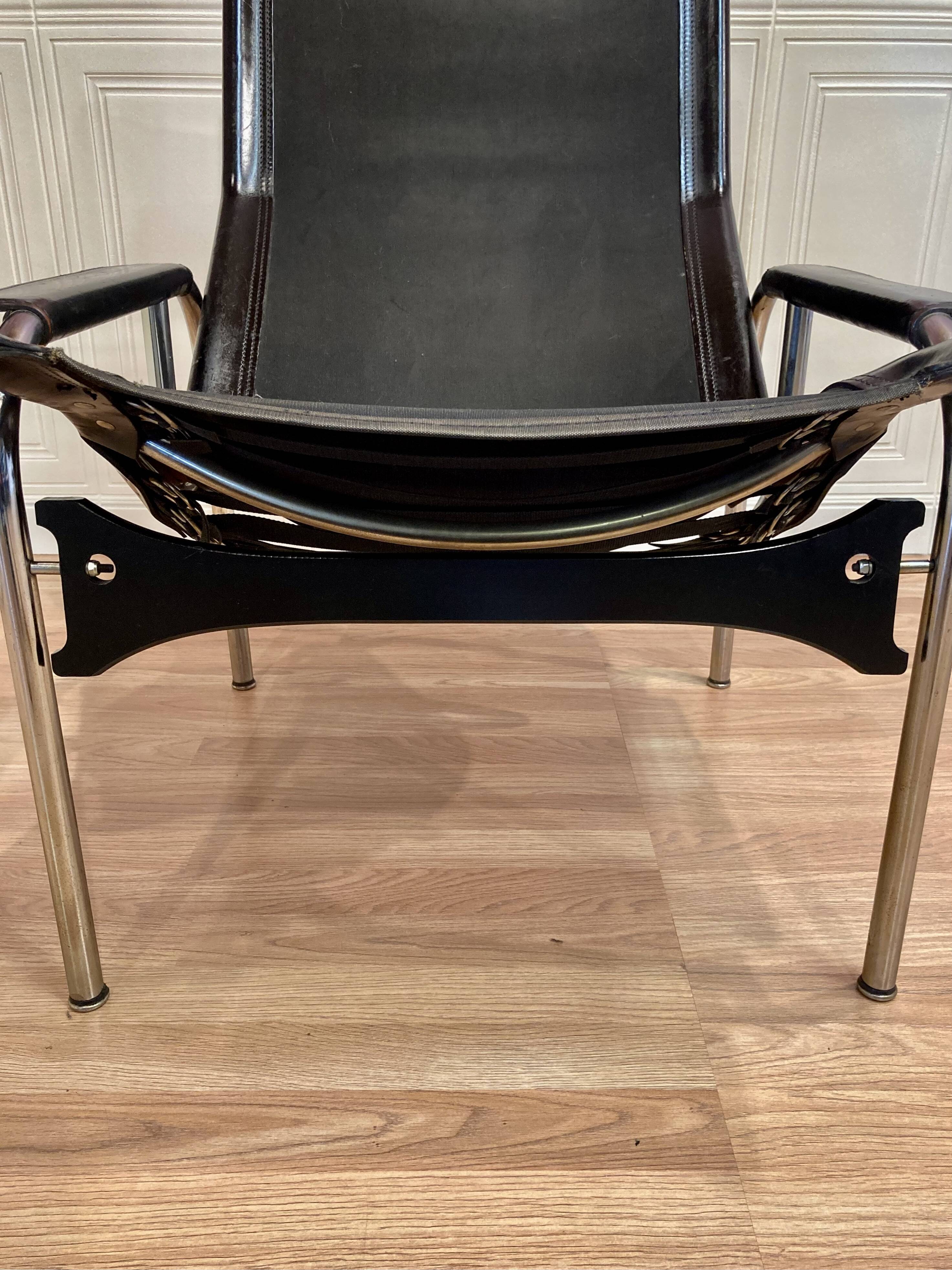 Black leather reclining lounge chair, "Hans Eichenberger" design, 1960.